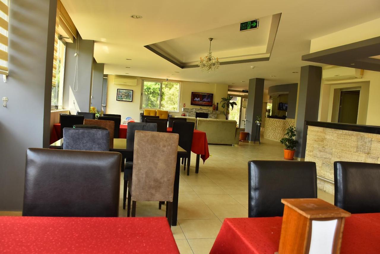 Nora Suit Hotel Side Bagian luar foto