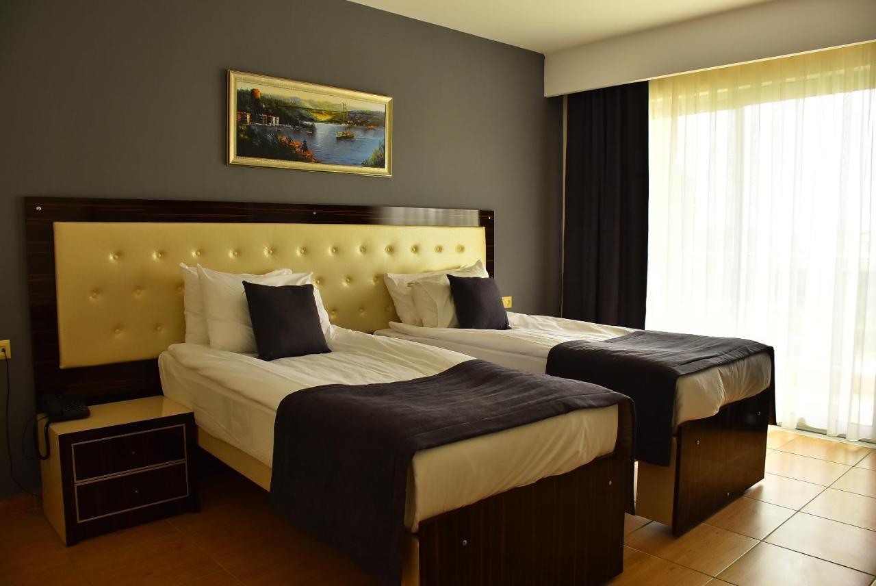 Nora Suit Hotel Side Bagian luar foto