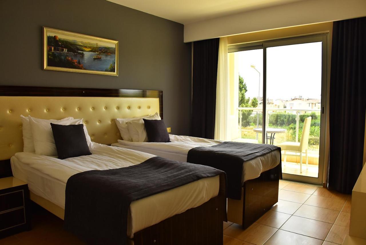 Nora Suit Hotel Side Bagian luar foto