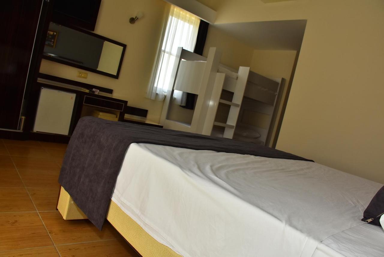Nora Suit Hotel Side Bagian luar foto